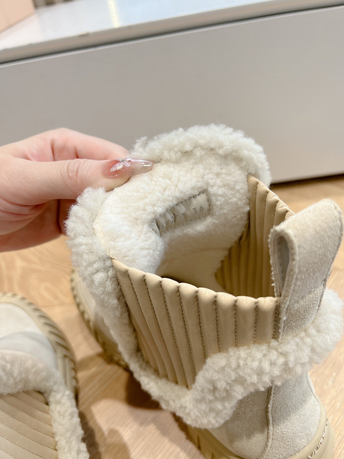 Louis Vuitton suede ankle boot, beige shearling interior and ribbed side panel