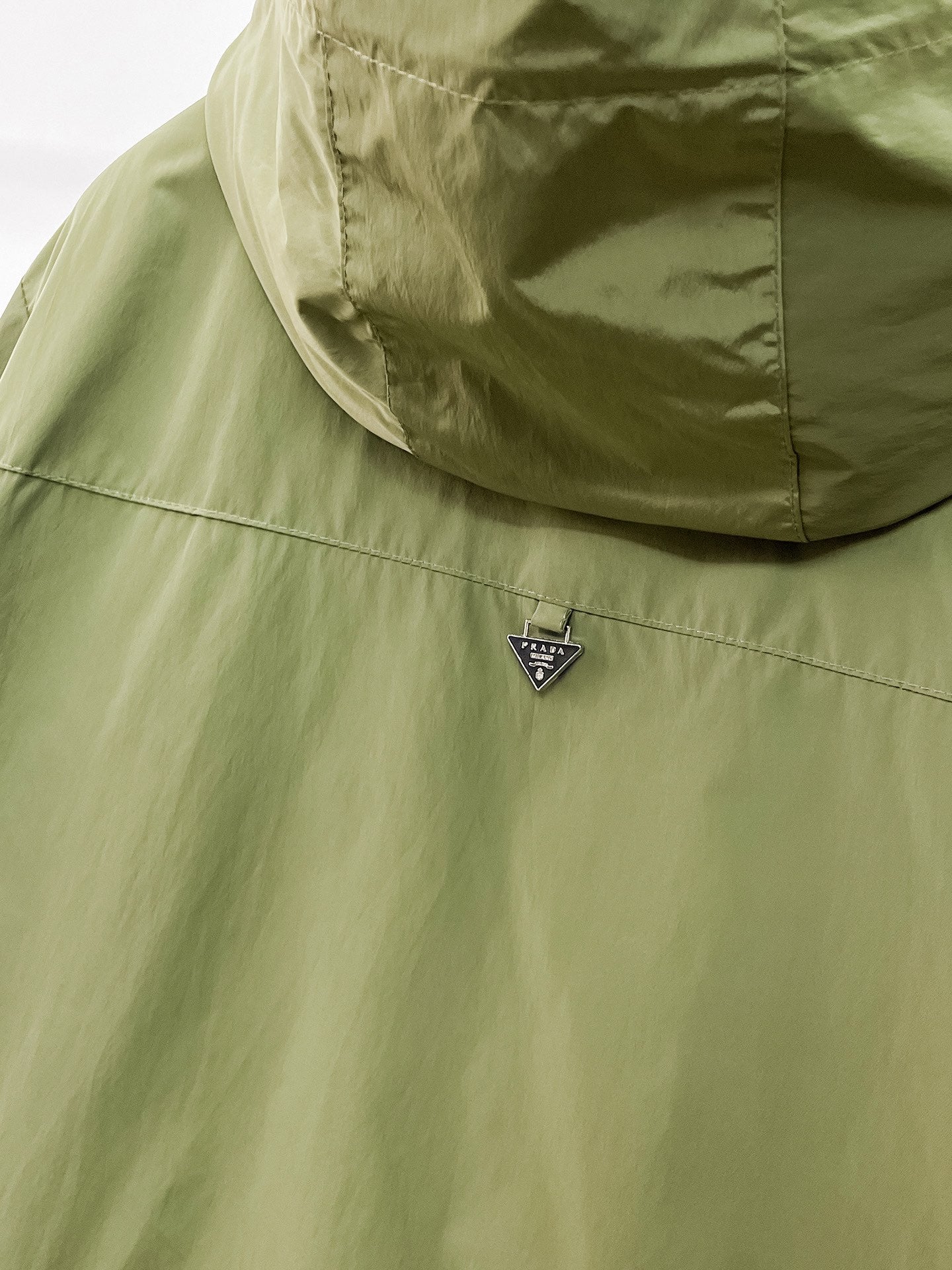Prada hooded long jacket chest area with triangular logo patch