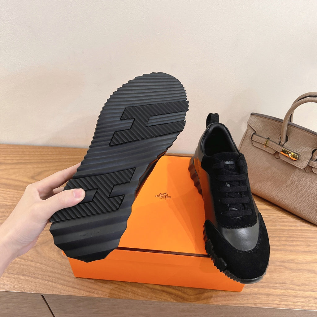 Unisex sneaker outsole, black tread pattern on chunky rubber sole