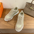 Hermes unisex sneakers, light suede upper, white rubber sole and lace-up design