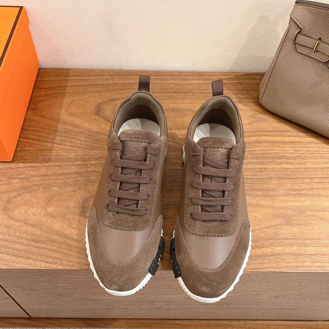 Hermes unisex sneakers in taupe suede with lace-up front and white rubber sole