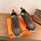 Hermes unisex sneakers with taupe suede uppers, laces, and thick white sole