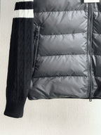 Long puffer jacket with front zipper and ribbed knit sleeves, striped cuffs