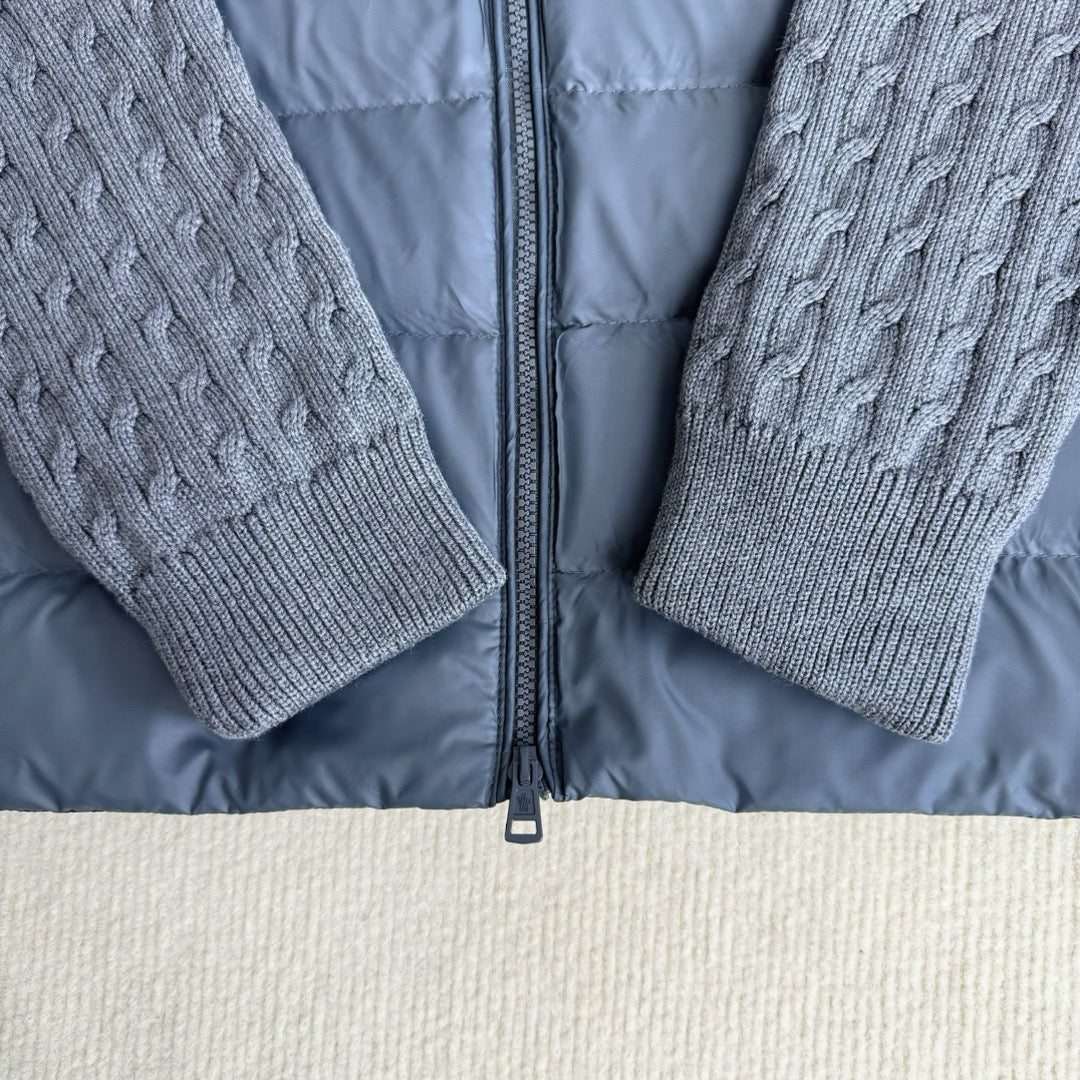 Long puffer jacket front with zipper and knit sleeves, open collar view