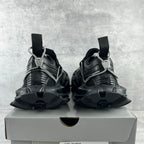 Balenciaga unisex sneakers heel view, black chunky sole with rear support straps
