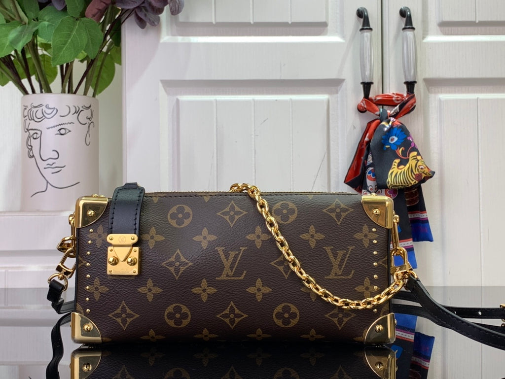 Louis Vuitton monogram crossbody bag with gold chain strap and dark leather trim