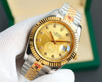 Two-tone wristwatch with gold dial, gold bezel, metal jubilee bracelet