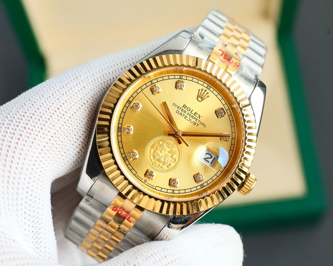 Two-tone wristwatch with gold dial, gold bezel, metal jubilee bracelet