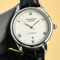 Rolex wristwatch with white dial, black leather strap, round silver case