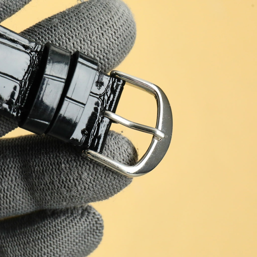 Rolex wristwatch buckle and black leather strap with silver clasp