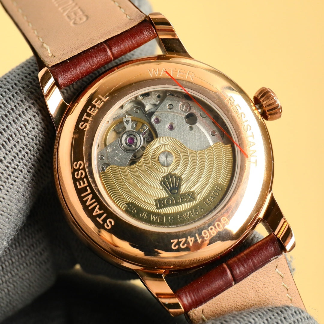 Gold-tone Datejust open caseback with visible movement, brown leather strap