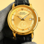 Rolex Datejust gold wristwatch with gold dial, Roman numerals, black leather strap