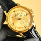 Rolex Datejust gold wristwatch with gold dial, date window, black leather strap