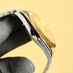 Rolex watch profile with gold bezel, polished case, and two-tone bracelet links