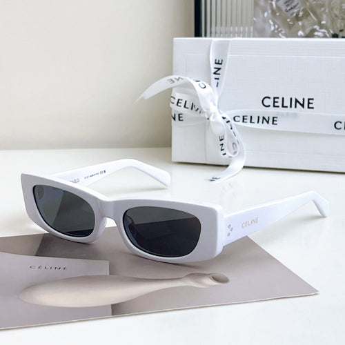 Celine sunglasses, white frame with dark lenses, full-rim cat-eye style.