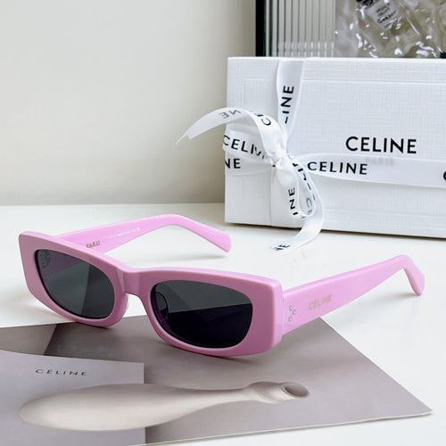 Celine sunglasses, pink frame with dark lenses, full-rim cat-eye style.