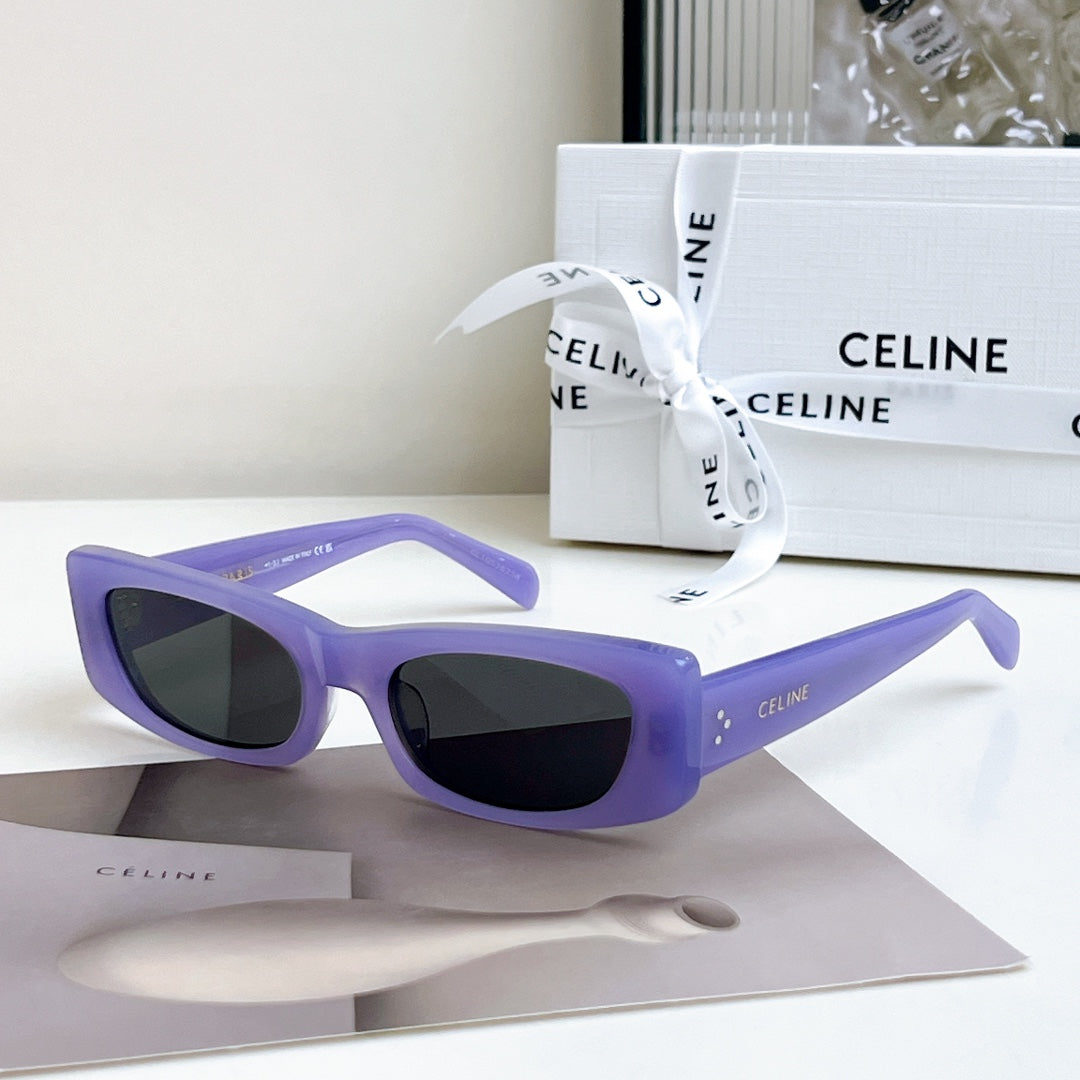 Celine sunglasses, purple frame with dark lenses, full-rim cat-eye style.