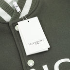 Dark green jacket with ribbed collar, snap buttons, and attached tag