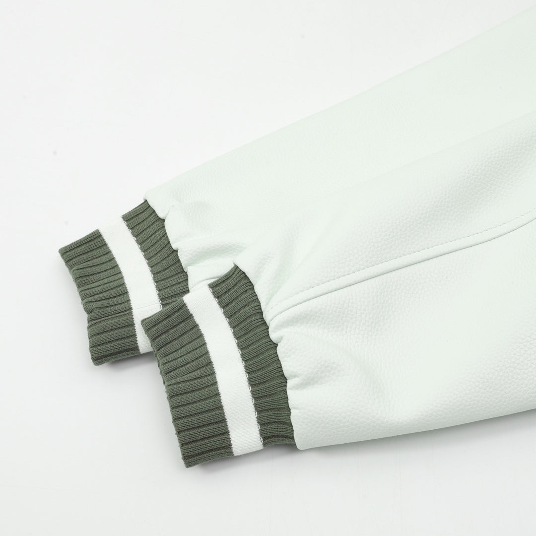 White sleeve fabric with dark ribbed cuff and striped trim