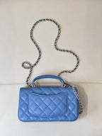 Chanel blue quilted flap shoulder bag with chain strap and gold CC emblem