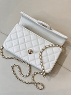 Chanel white quilted mini handbag with chain strap and front flap logo detail