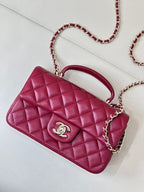 Chanel quilted flap bag, maroon-pink with chain strap and round CC logo