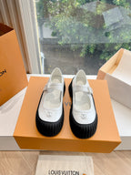 White and black Louis Vuitton unisex sneakers pair in box, strap closure and tread sole