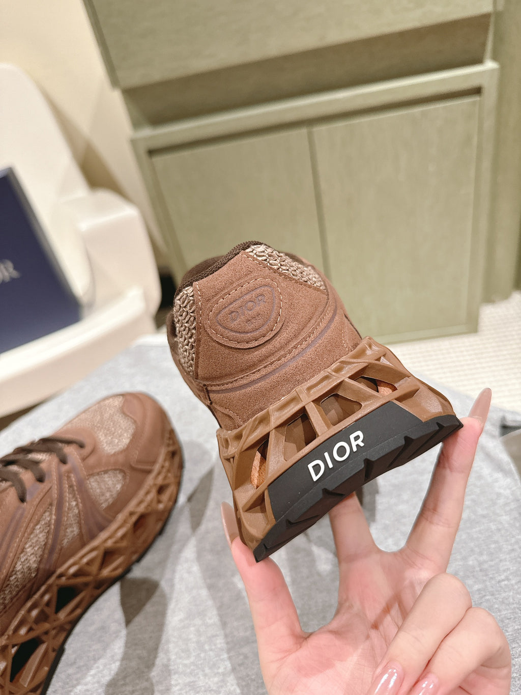 Unisex sneakers with brown tread sole and DIOR-branded black heel tag