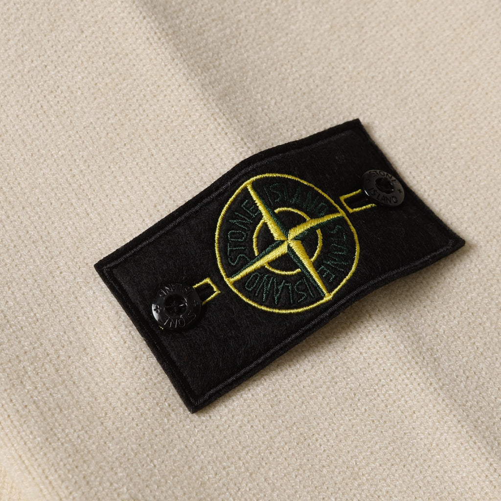 Black Stone Island logo patch with yellow emblem and two black snaps