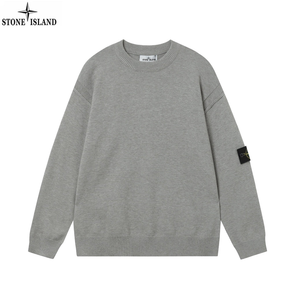 Stone Island knit crewneck sweater in gray with small logo patch on the sleeve