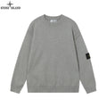 Stone Island knit crewneck sweater in gray with small logo patch on the sleeve