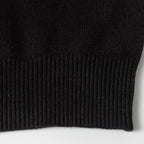 Black knit sweater ribbed cuff edge