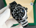 Rolex watch with black dial, blue date window, black bezel, black link bracelet