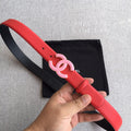 Red belt with pink CC buckle and adjustment holes