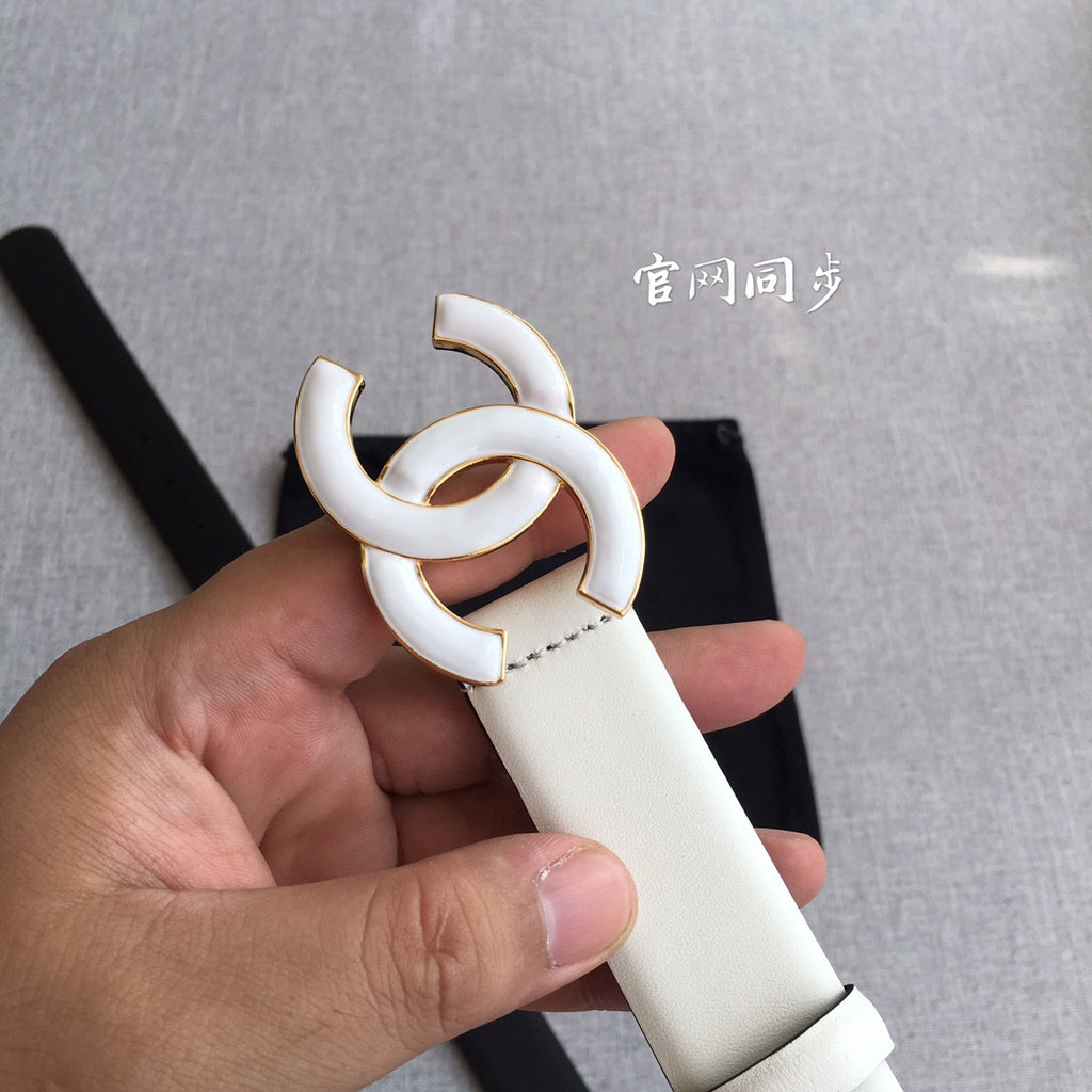 Chanel belt with ivory strap and gold-tone interlocking CC buckle, detail view