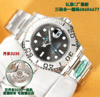 Stainless steel Rolex watch with black dial, stainless bezel, and link bracelet