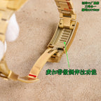 Gold watch bracelet underside with fold-over clasp and adjuster link area