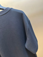 Louis Vuitton dark navy T-shirt sleeve and shoulder seam close-up