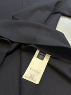Louis Vuitton T-shirt care label inside neck with gold-toned tag