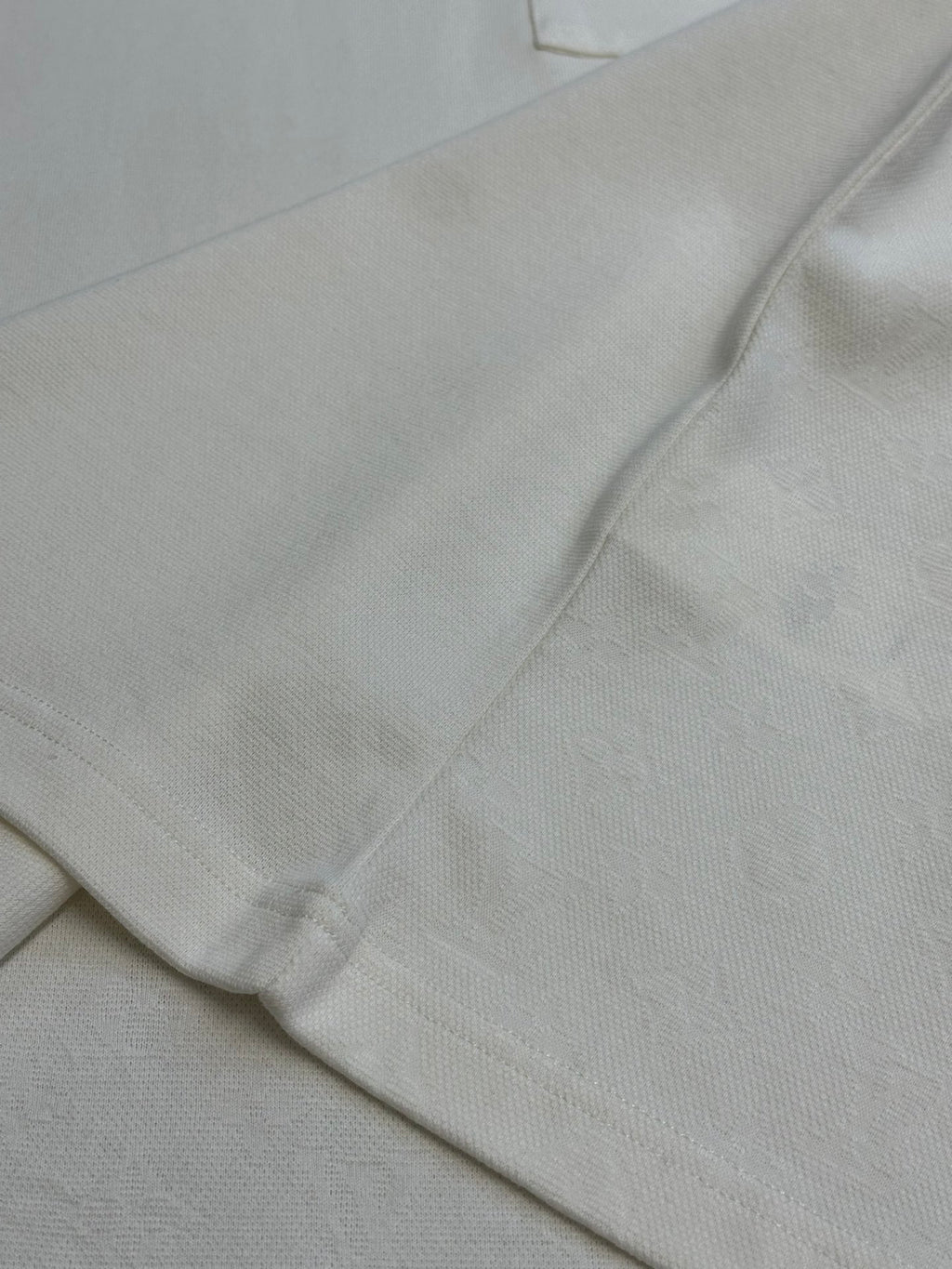 Louis Vuitton white T-shirt hem with soft fabric fold