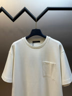 Louis Vuitton white crewneck T-shirt with chest pocket, front angled view