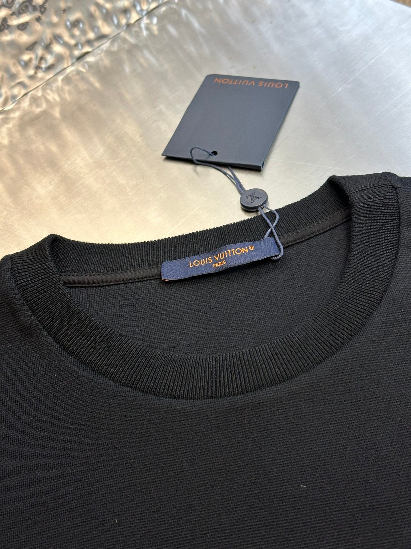Louis Vuitton T-shirt crew neckline with hanging tag and ribbed collar