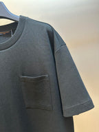 Louis Vuitton short-sleeve T-shirt with chest pocket and textured fabric close-up