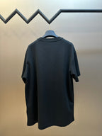 Louis Vuitton short-sleeve T-shirt viewed from the back, dark color