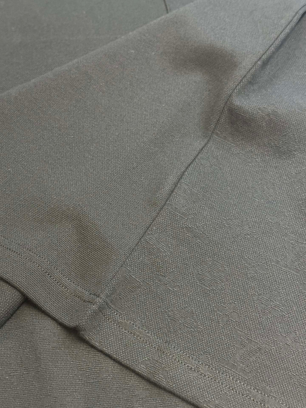 Louis Vuitton T-shirt sleeve hem with seam stitching close-up
