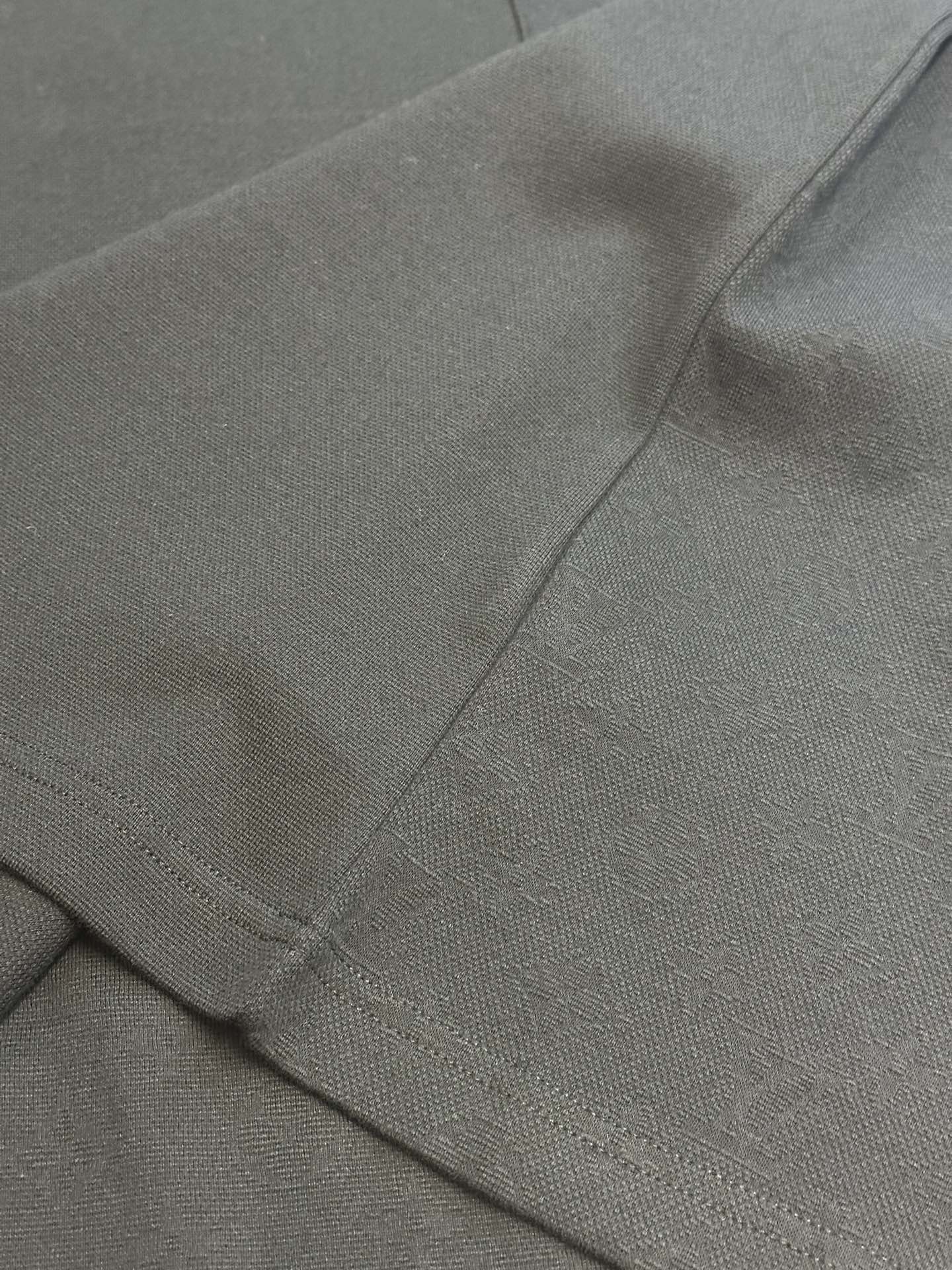 Louis Vuitton T-shirt sleeve hem with seam stitching close-up