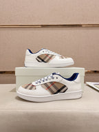 Burberry pair of white low-top sneakers with plaid panel and blue heel detail