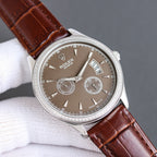 Rolex chronograph watch with dark dial, brown leather strap, silver case and subdials