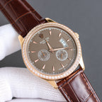 Rolex chronograph watch with dark dial, rose-gold bezel, brown leather strap and subdials