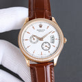 Rolex chronograph watch with white dial, brown leather strap, rose-gold case and bezel